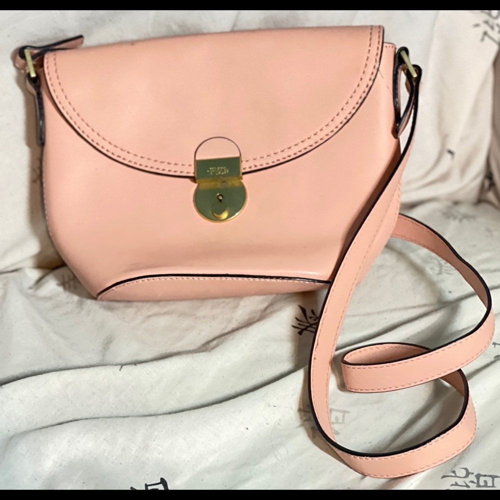 Kate Spade Saturday adjustable crossbody bag in baby pink with stripe interior